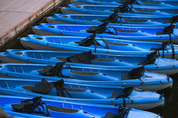 Blue Kayak on a lake in Matka Canyon - obrazy, fototapety, plakaty