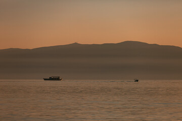 Fototapeta na wymiar Sailing into the Sunset on Lake Ohrid, North Macedonia