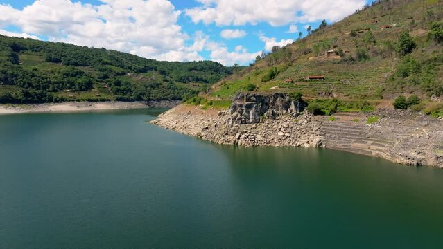 Rocky Cliffs And Mountain Around The Belesar Reservoir  - aerial