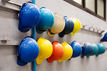 Safety Construction Worker Hats Blue, white, yellow, orange. Teamwork of construction team must...