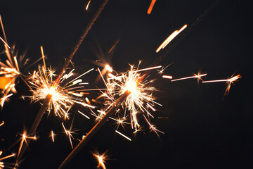 Sparkler and Fireworks - Wunderkerze - Neujahr / Silvester / Feier - Glittering - Burning Sparkler,...