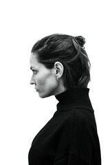Fototapeta premium Black and white art studio portrait of a beautiful elegant woman in a black turtleneck. Elegant ballet style. Dramatic portrait of a young beautiful girl on a white background in the studio.