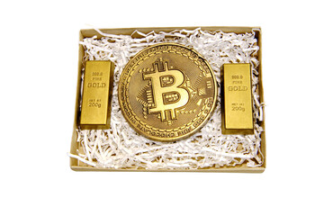 Cryptocurrency coin bitcoin and gold from chocolate as a gift, isolated on a white background