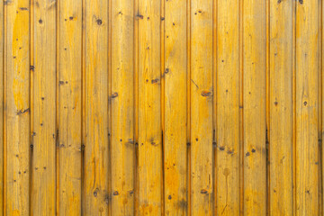 Wooden yellow natural wall as a texture