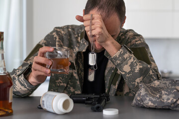 one man sit at home with bottle of liquor drink whiskey drunk alcoholic Alcohol abuse, addiction...