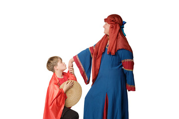 A woman in a medieval European dress and a boy bending his knee kisses her hand, isolated on white background