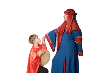 A woman in a medieval European dress and a boy bending his knee kisses her hand, isolated on white background