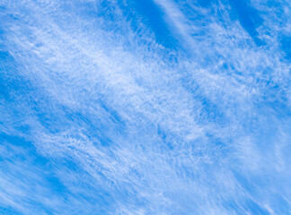 Blue sky with beautiful thin spindrift clouds. Background.