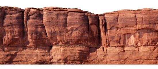 The walls of the canyon are made of sandstone that is red in color