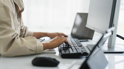 Developer programmer typing code on keyboard for programming to developing web and application