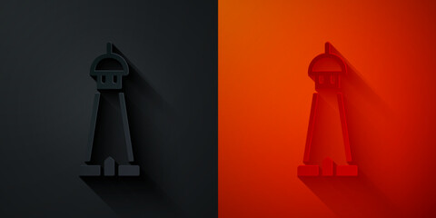 Paper cut Mosque tower or minaret icon isolated on black and red background. Paper art style. Vector