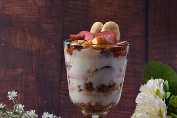 Delicious yogurt ice scream with Fruits and Slide of Applie
