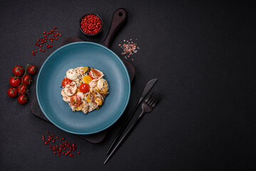 Delicious fresh salad with chicken, quail eggs, cherry tomatoes, lettuce