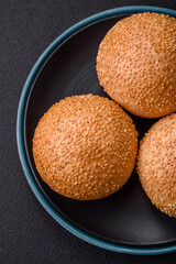 Delicious fresh crispy white round bread with seeds and grains