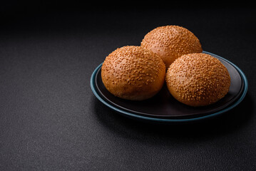 Delicious fresh crispy white round bread with seeds and grains
