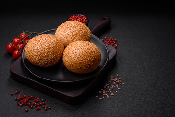 Delicious fresh crispy white round bread with seeds and grains