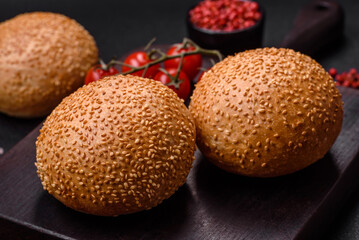 Delicious fresh crispy white round bread with seeds and grains