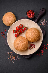 Delicious fresh crispy white round bread with seeds and grains