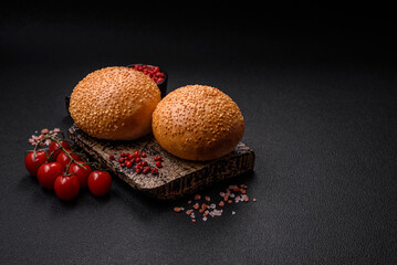Delicious fresh crispy white round bread with seeds and grains