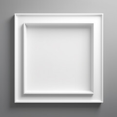 empty white picture frame lying on grey wall