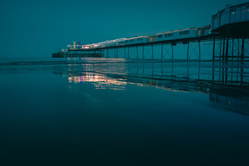 Long exposure photo of a pier at blue hour