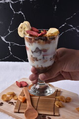 Sweet Yogurt Cream Ice Cream with Fresh Fruits in a Glass Bowl