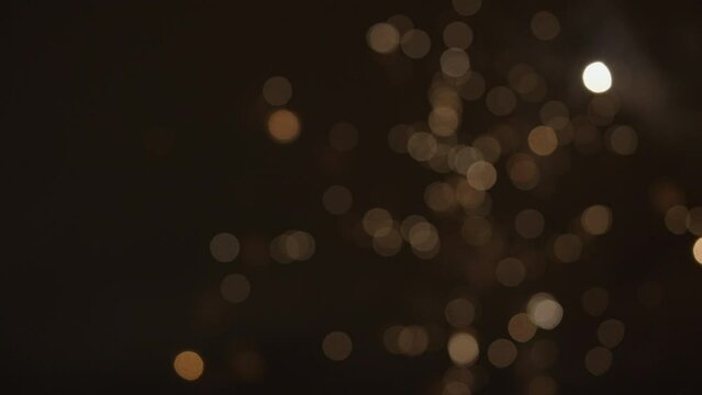 Slow motion blurred background of fireworks in dark sky, celebratation