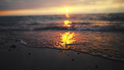 Seashore at beach. Summer seascape. Travel at paradise. Advancing waves and washed border, water and land. Blue sea water in sunset time. Amazing tropical nature.