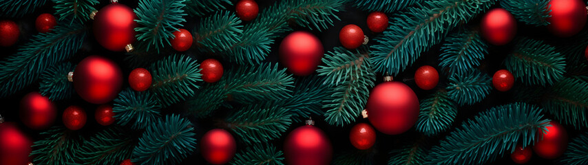 Obraz na płótnie Canvas Fir branches and red balls and baubles green needle abstract background Christmas texture. Horizontal composition, banner.