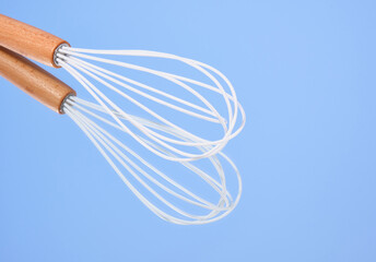 A whisk for cooking in the kitchen. Copy space for text.