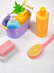 Various skin care tools. Shower brush, soap, shower gel, basin. Bathroom set.