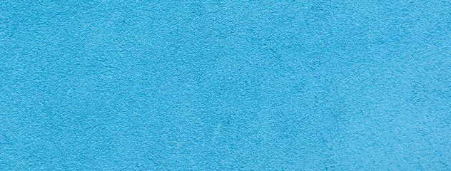 Light pastel blue abstract background for design. Color gradient. Rough wall texture, grain, and noise. Wallpaper.