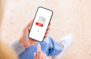 Person holding mobile phone with