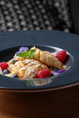 Cottage cheese pancakes with coconut and vanila sauce. Healthy and delicious morning breakfast.