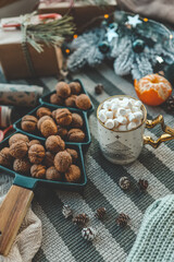 Cup of cocoa with marshmallows in a Christmas atmosphere