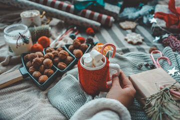 Cup of cocoa with marshmallows in a Christmas atmosphere