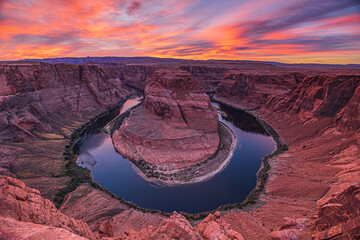 Sunset over Horseshoe Bend. View of the Colorado River valley in the evening with its reddish...