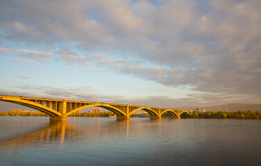 The famous "Communal" bridge in Krasnoyarsk at sunset, Russia