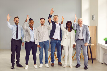 Full length portrait of a happy smiling joyful diverse company employees or a group of staff...