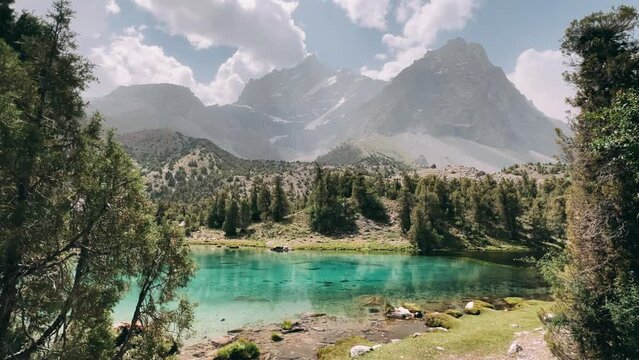 The Alaudin (Chapdara) lakes, lying at an altitude of 2800 m, are considered one of the most beautiful lakes of the Fan Mountains. Turquoise mountain lake. Pamiro-Alai. Tajikistan, Pamir 4K