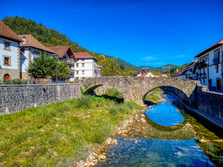Ochagavia medieval bridge saves the Anduña River as it passes through the town of...