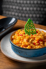 Bulgur with vegetables. Healthy food, close-up. Serving food in a restaurant