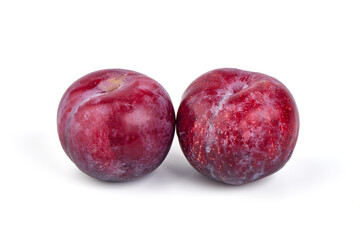 Obraz premium Sweet red plums, isolated on white background.