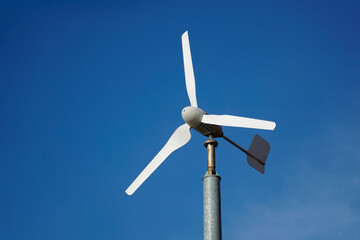 Wind turbine and sky in background