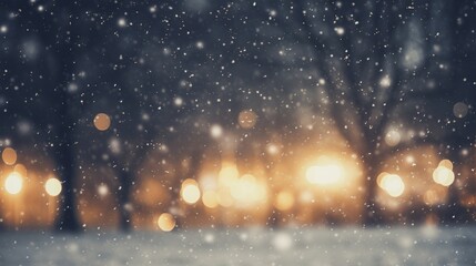 Fototapeta na wymiar falling snow in the city blurred background.