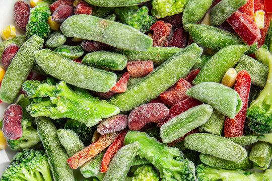 frozen vegetables mix broccoli, corn, carrots, green peas, green beans, bell peppers, beans fresh delicious healthy eating cooking appetizer meal food snack on the table