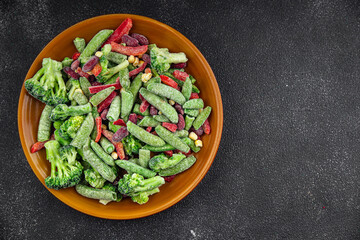 frozen vegetables mix broccoli, corn, carrots, green peas, green beans, bell peppers, beans fresh delicious healthy eating cooking appetizer meal food snack on the table