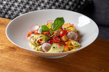 Salad Pannmole with fresh vegetables and croutons