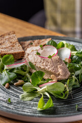 Canard Foie gras Pate made of the liver of a duck or goose with toasted bread slice.