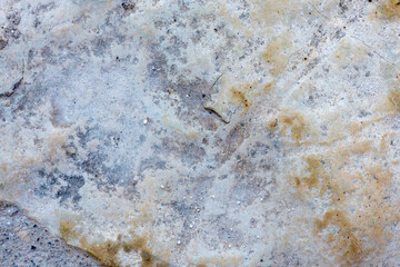 Colours, textures and patterns on a natural stone. Stone background.